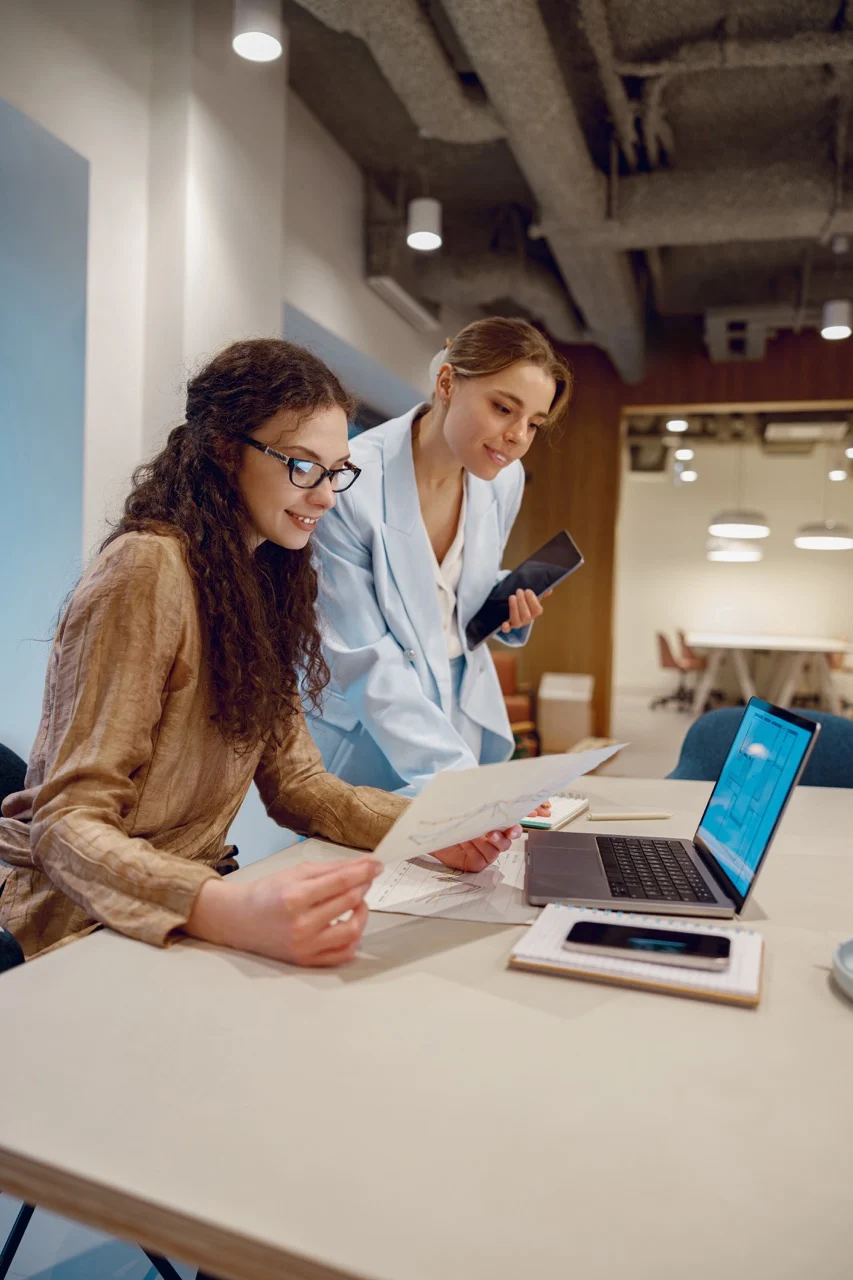 marketing and public relations team reviewing campaign strategy